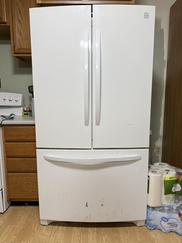 Refrigerator doors in Worthington before cleaning