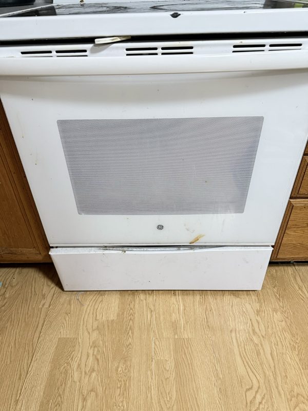 Oven front and drawer in Worthington before cleaning