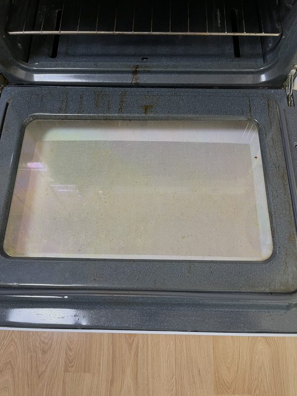 Inside the oven in Butler before cleaning