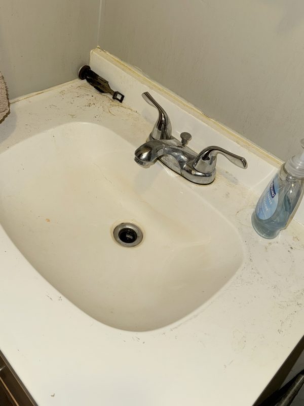 Bathroom vanity in Allison Park before cleaning